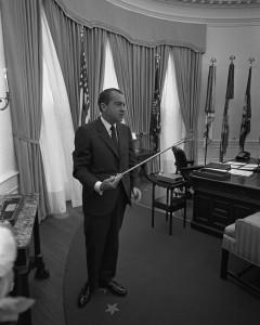 Richard Nixon with lunar tongs. Photo courtesy of the White House / National Archives.