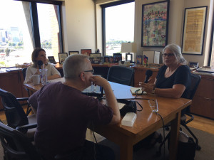 Multnomah County Chair Deborah Kafoury, Doug McVay (back to camera), and Central City Concern's Karen Kern.