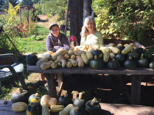 Rickiy & Aera show off their winter squash at Rahane Forest Farm