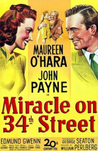 movie poster, man and woman facing each other, child and santa in background