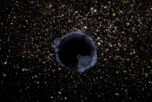 An artist's rendering of a black hole, an emptiness in space, surrounded by time-shifted stars. In the middle of the black hole, the Self Help Radio logo is peeking out.