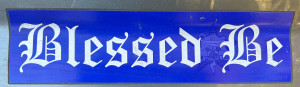 A bumper sticker that reads "Blessed Be" - a Howard Gently catchphrase - but with the Self Help Radio logo stuck on it.