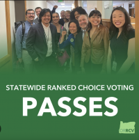 Oregon Ranked Choice Voting staff poses in hallway smiling