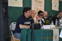 Sanho Tree (seated stage right) speaking on a panel at Seattle Hempfest